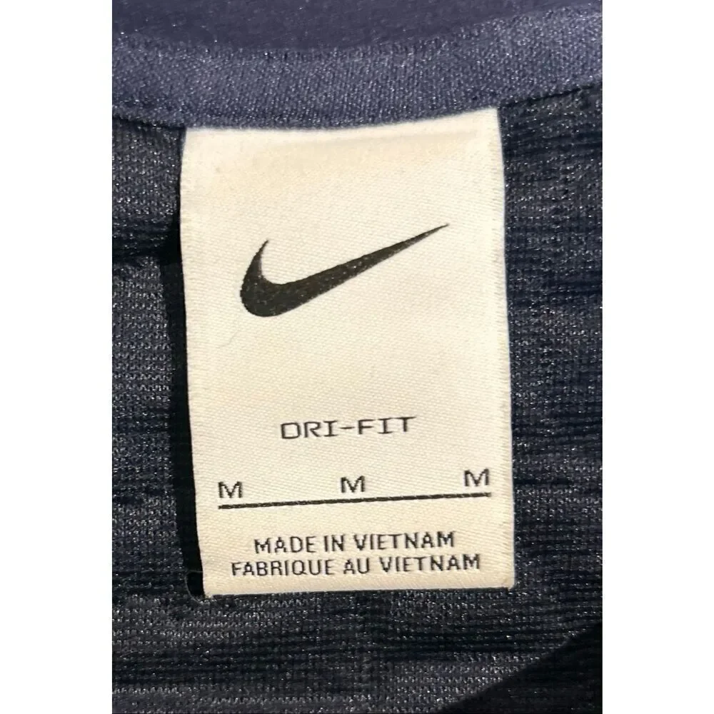 Nike Women's Dri-FIT Long-Sleeve Golf Mid Layer pullover in navy blue with a sub